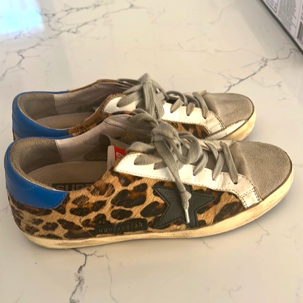 Golden Goose Superstar leopard-print low top sneakers.